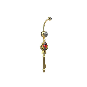 Gold key-shaped belly ring with a red heart and gemstone