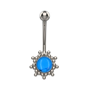 Belly button ring with blue gem and silver floral design