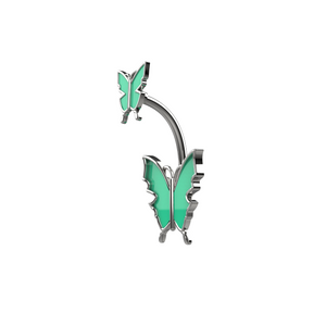 Butterfly-shaped navel piercing with green wings 