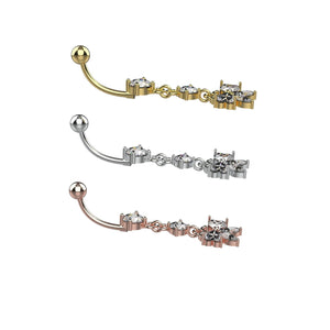 Three belly buttons with gold, silver, and rose gold finishes 