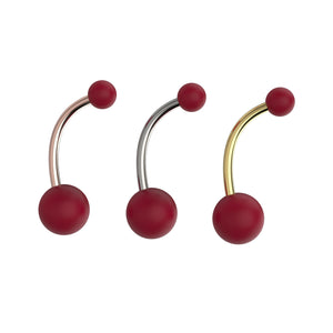 Three curved earrings with red spherical ends