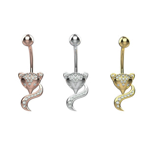 Three belly button rings shaped like foxes with diamond details 
