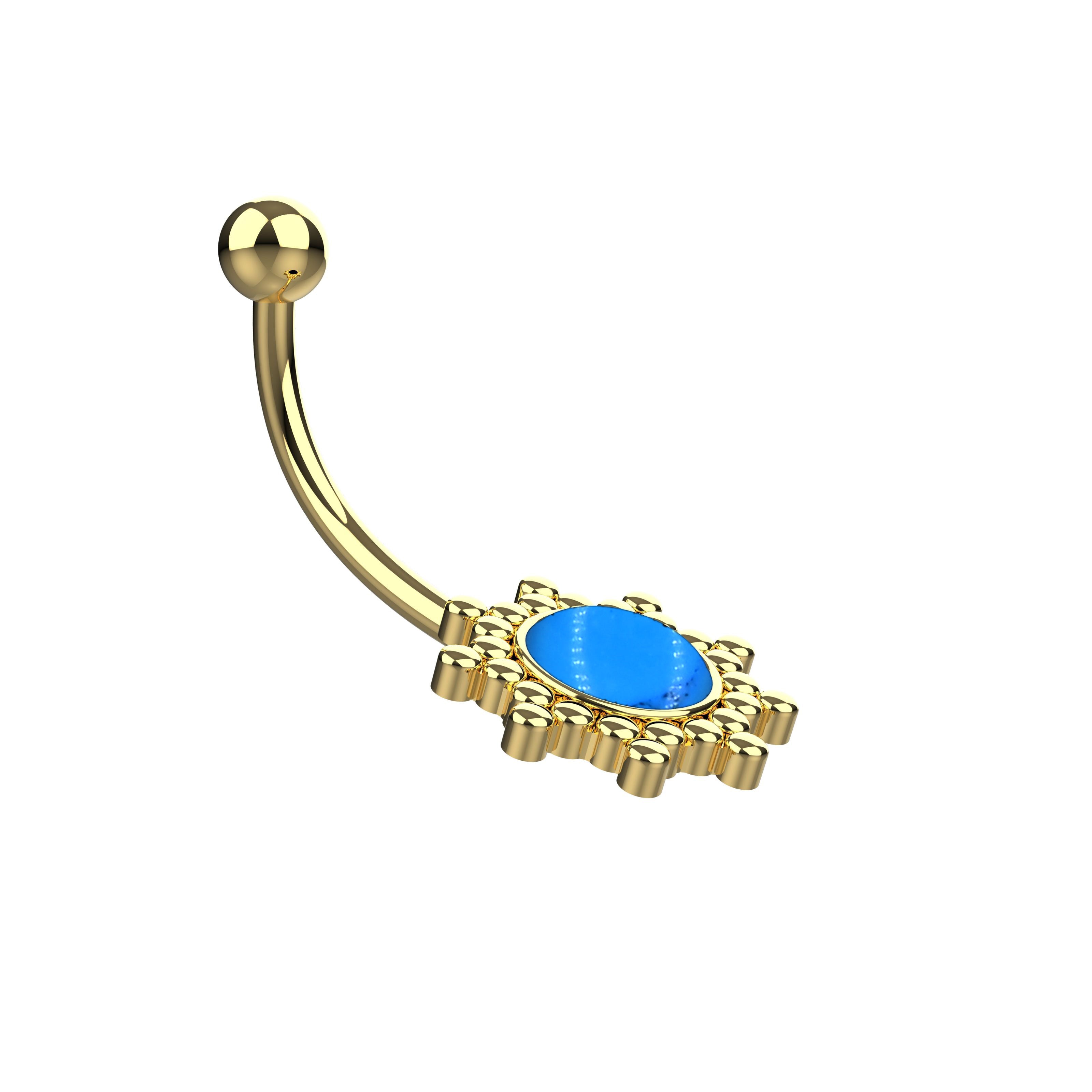 Gold belly button ring with a blue stone 