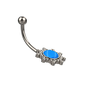   Silver belly button ring with a blue gemstone 