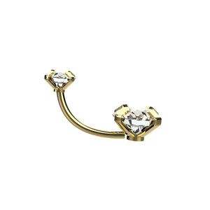 Gold navel piercing with two clear gemstones 